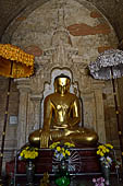 Bagan Myanmar. Htilominlo temple. Main Buddha statue of the ground floor. 